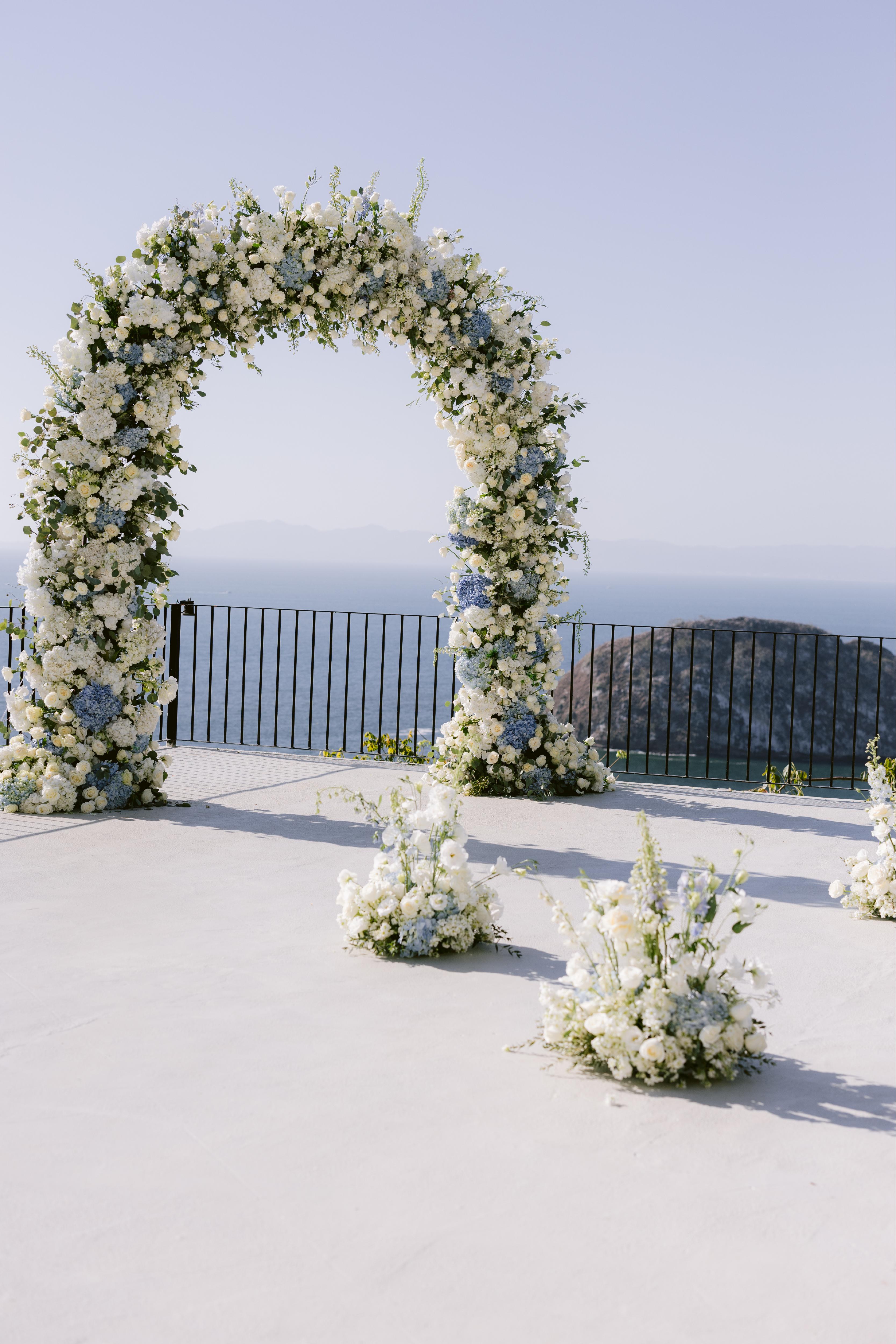 Floral arch overlooking the ocean